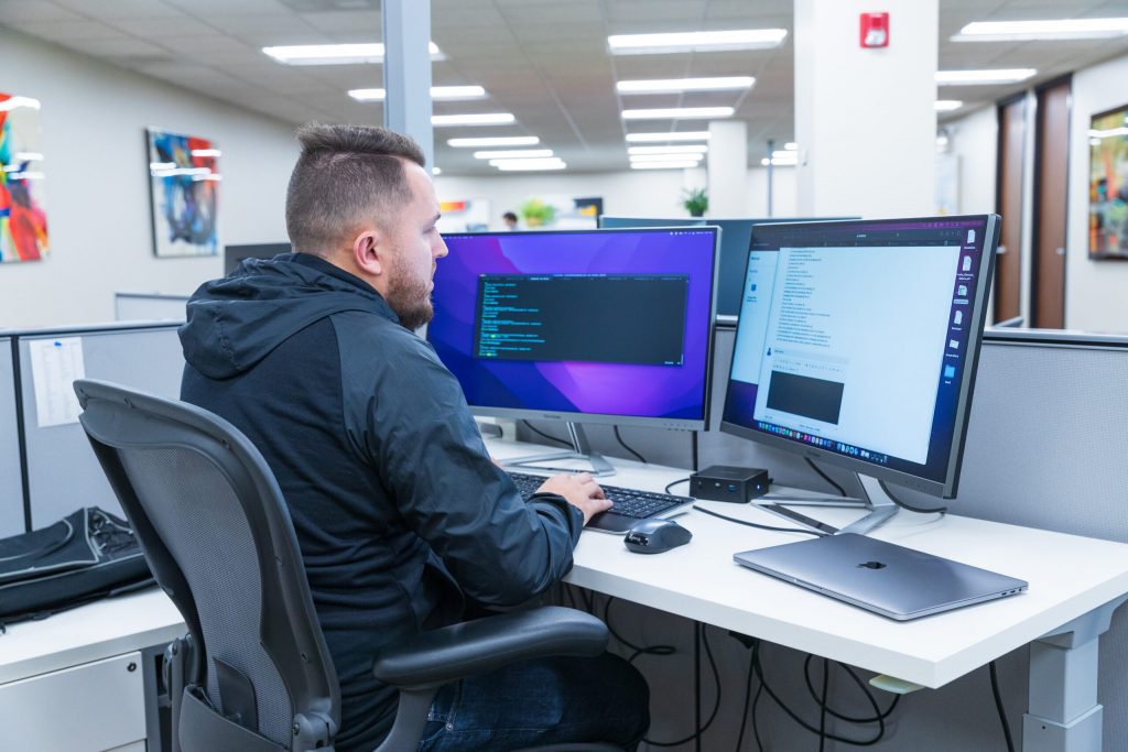 A Rubicon team member programming the ERP software