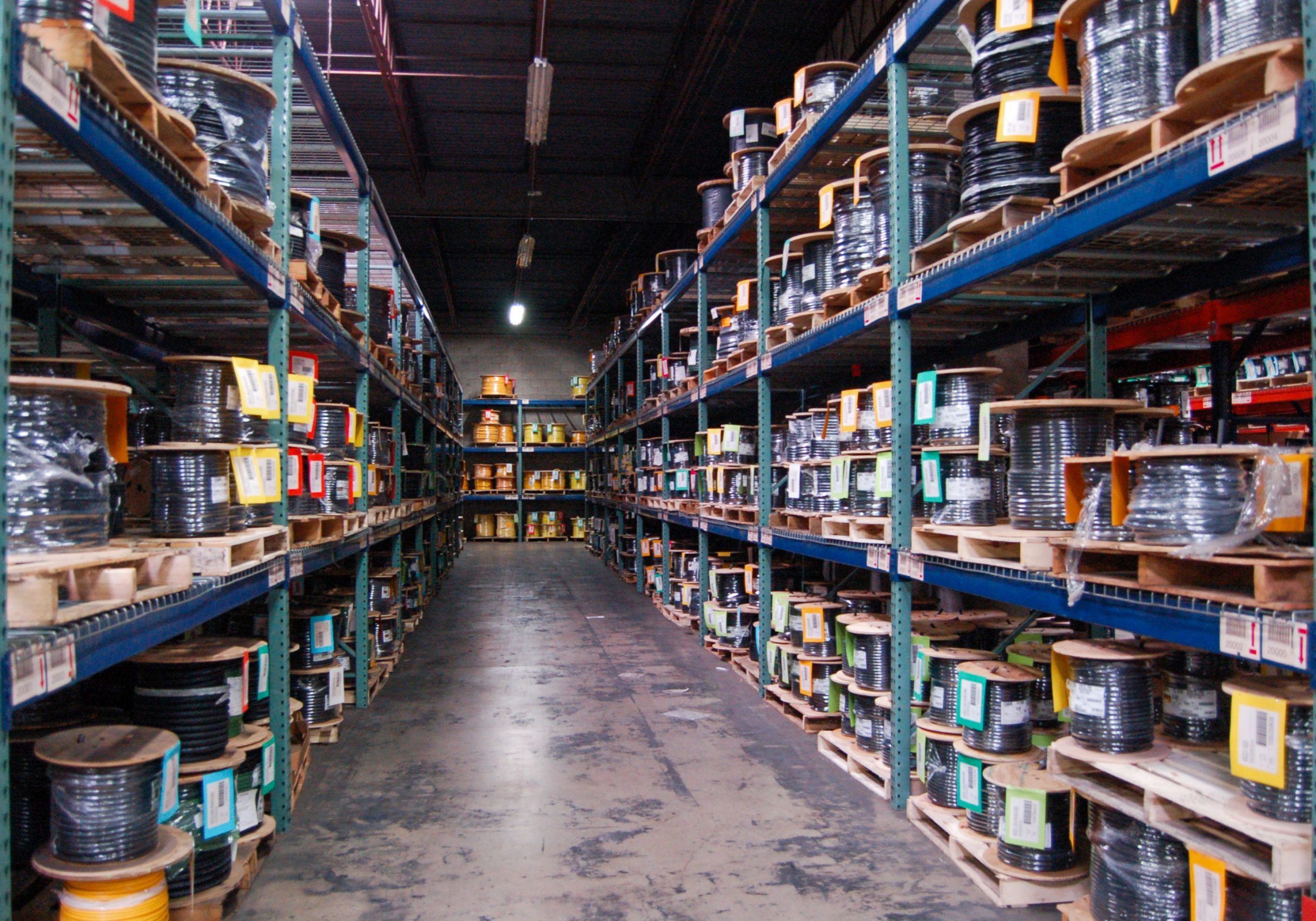 A warehouse full with reels of wire.