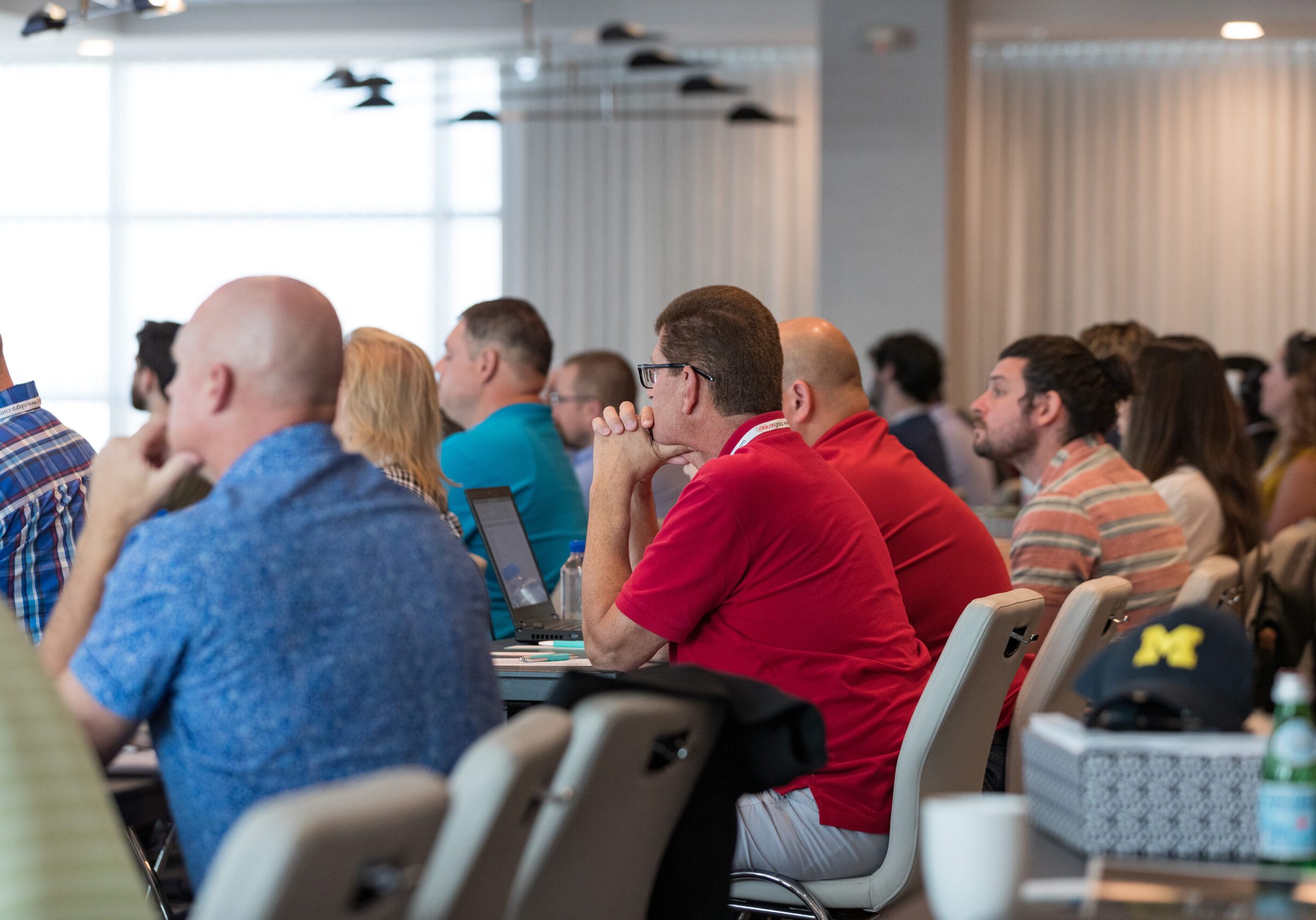 Attendees at The Users Group carefully listen to the Rubicon Team presenting.